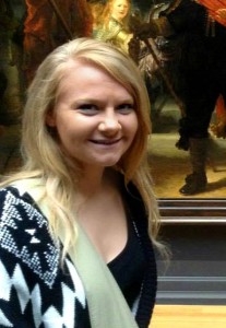 Alison Ranniger, NCAG Summer Intern in front of Rembrandt's "The Nightwatch"