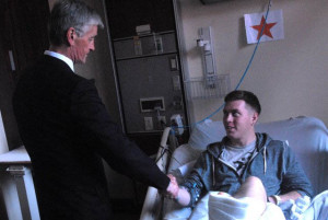 PFC Kyle Foster being visited by Secretary of the Army in 2011 while recovering from his combat injuries.